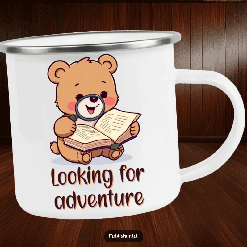 Funny camping mug with a gleeful bear character examining a manuscript with a magnifying glass, designed for outdoor reading enthusiasts.