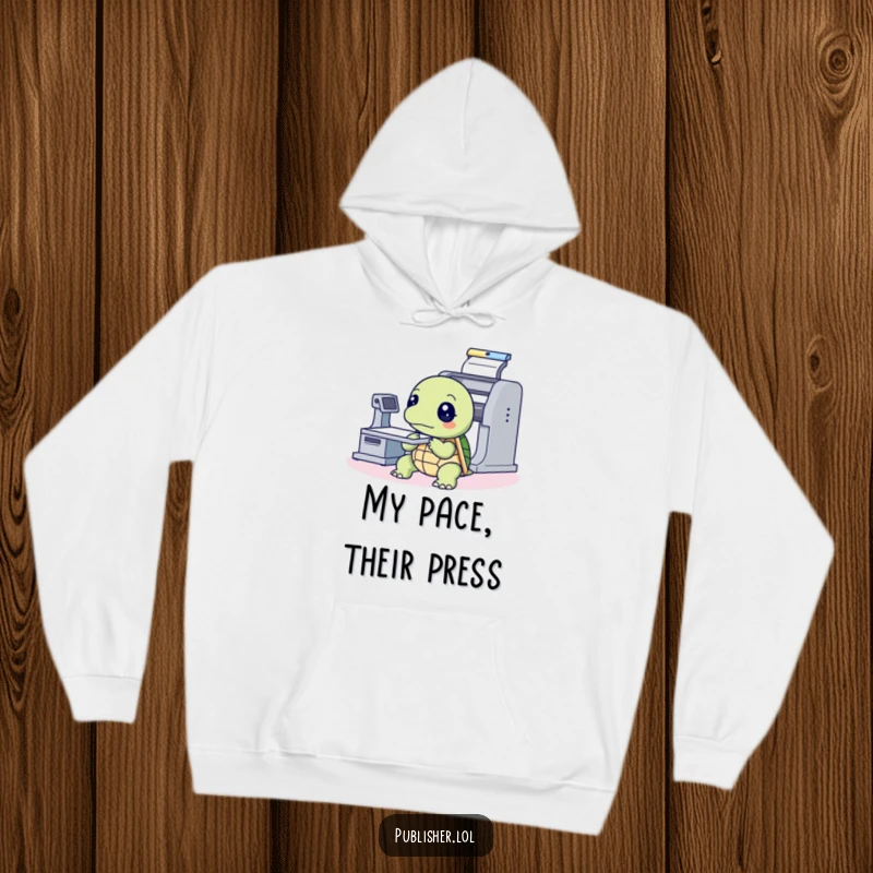 Funny Hoodie featuring a thoughtful turtle observing a printing press machine, offering cozy humor for moments of deep thought and reflection.